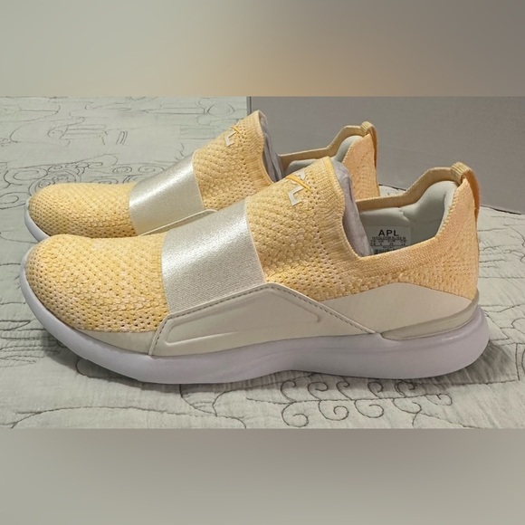 NIB APL Techloom Bliss Sz 7.5 Pristine Marigold Yellow Slip-on